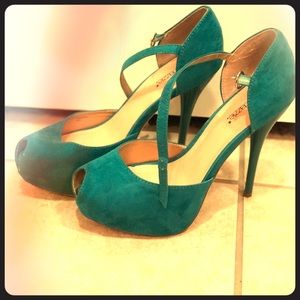 Turquoise peep toe pumps